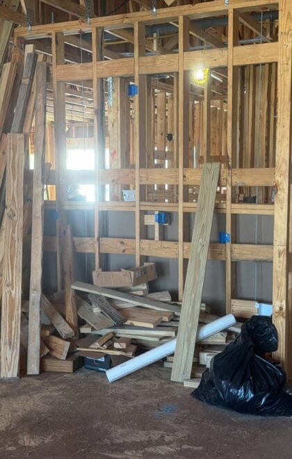 Active construction with framing and stored lumber